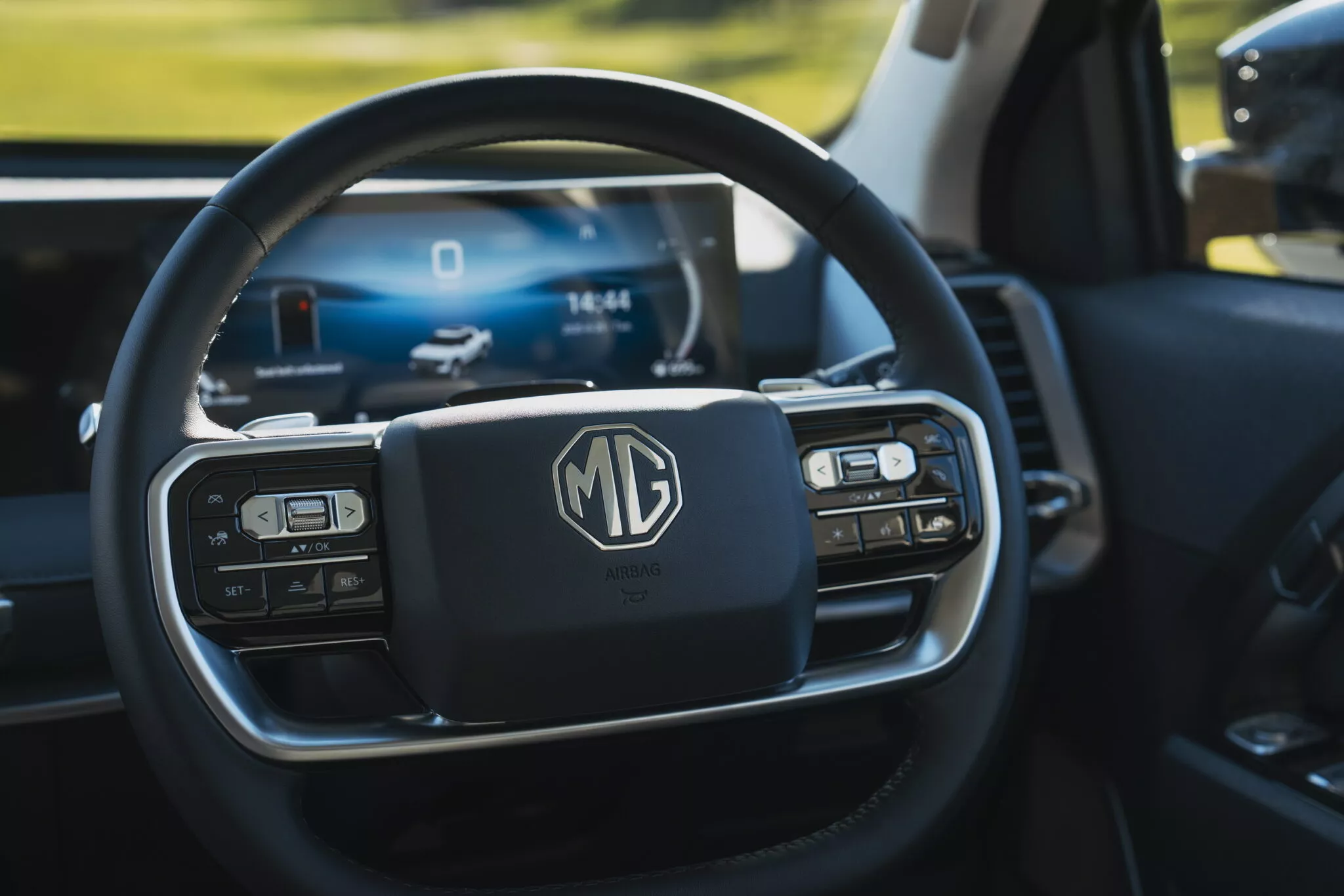 MG